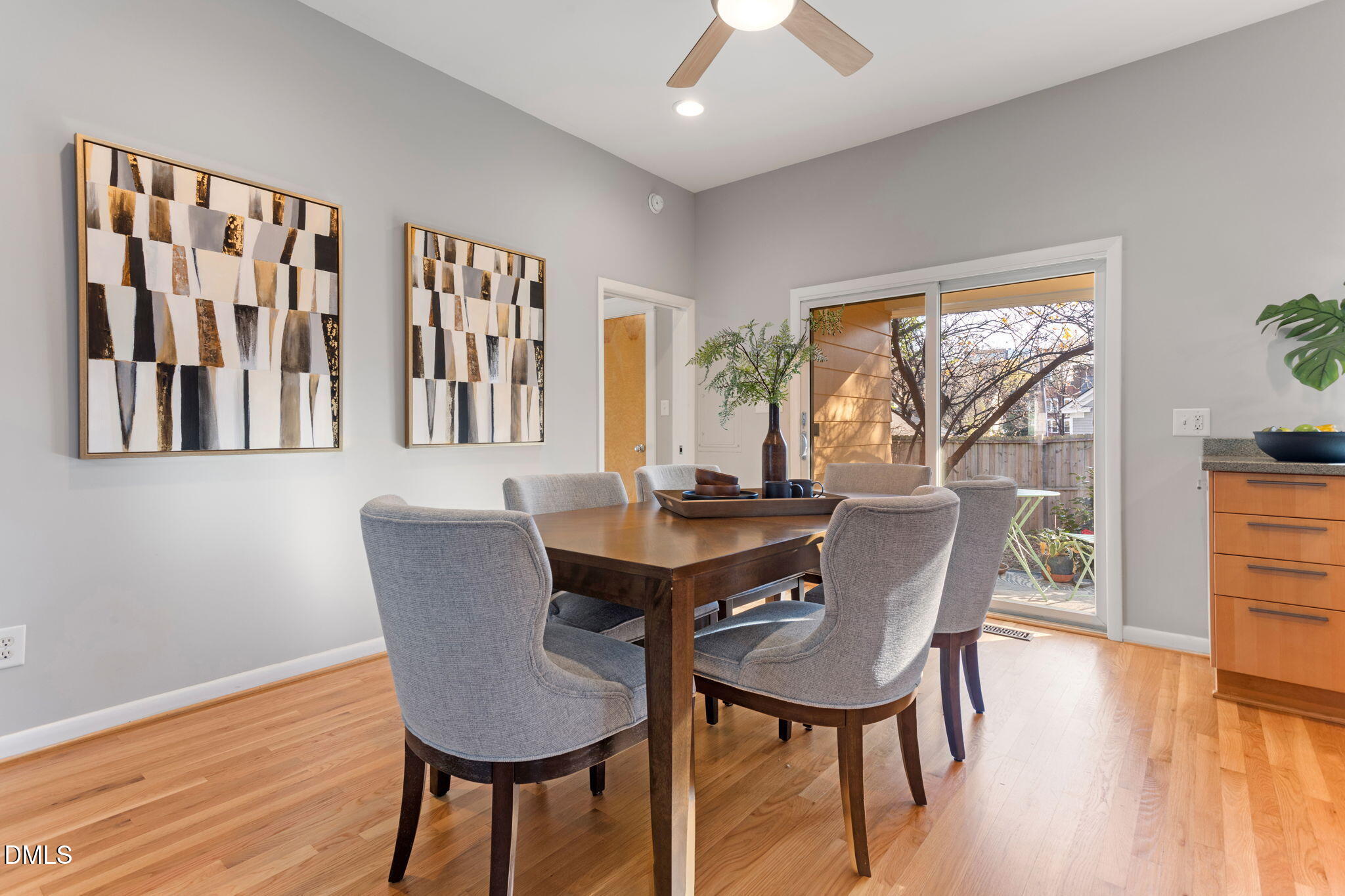 709 West North Street Raleigh, NC 27603 - Photo 24 of 42 a view of a dining room with furniture window and wooden floor