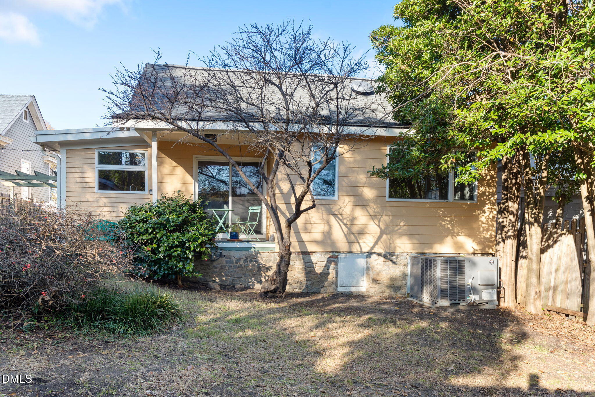 709 West North Street Raleigh, NC 27603 - Photo 37 of 42 a view of a small house with a tree in the yard