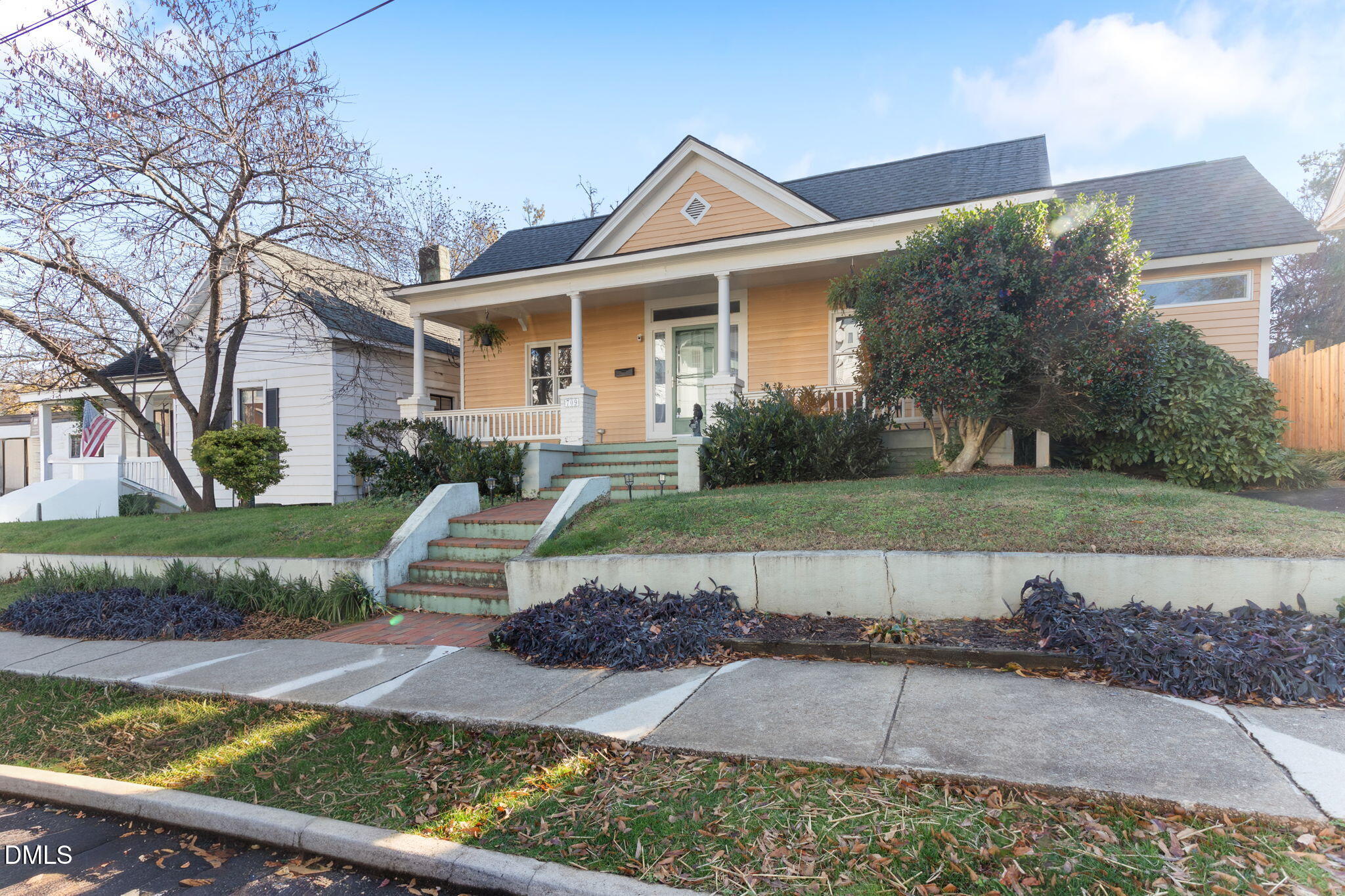 709 West North Street Raleigh, NC 27603 - Photo 4 of 42 a front view of a house with a yard