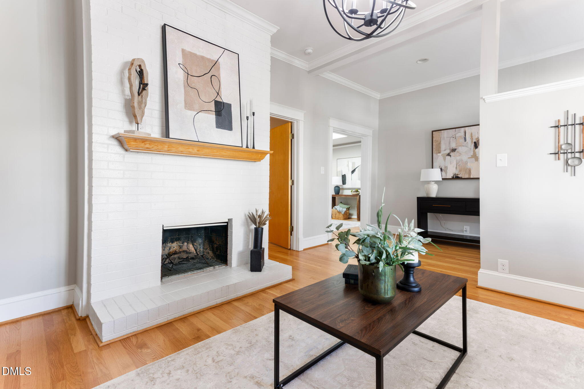 709 West North Street Raleigh, NC 27603 - Photo 5 of 42 a living room with furniture and a fireplace