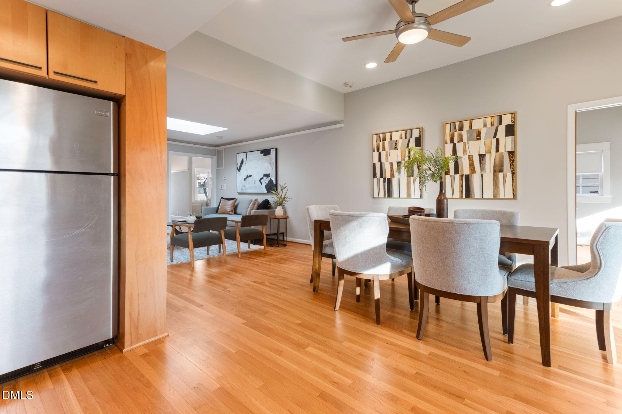709 West North Street Raleigh, NC 27603 - Photo 8 of 42 a view of a dining room with furniture and wooden floor