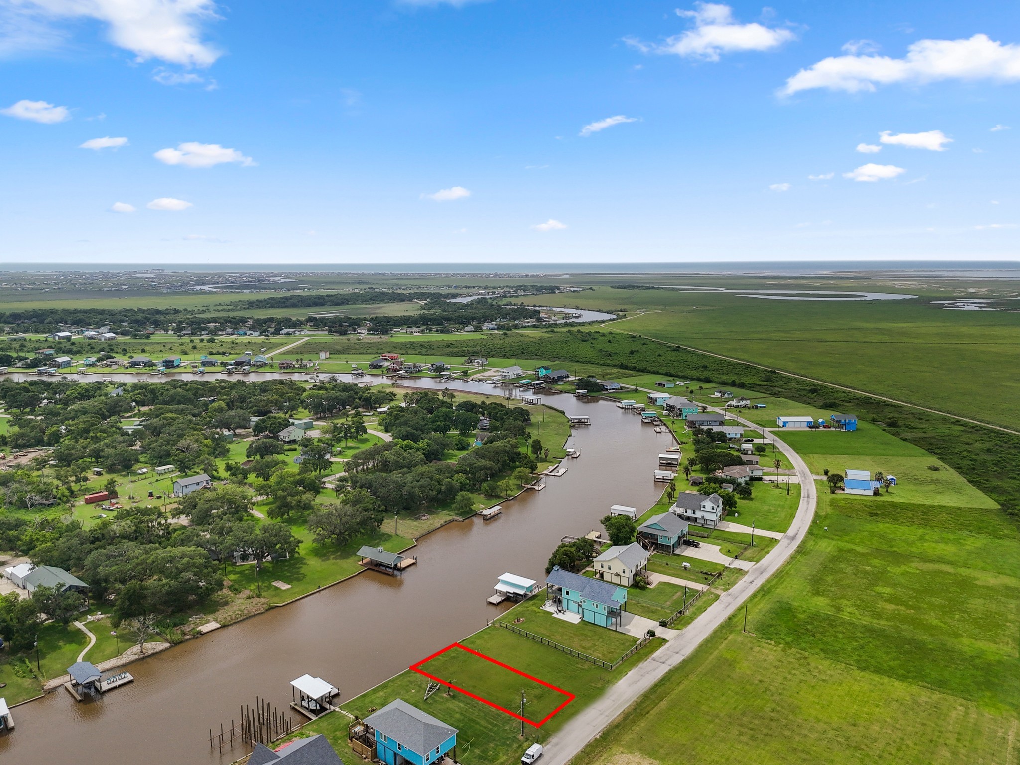 an aerial view of ocean residential houses with outdoor space