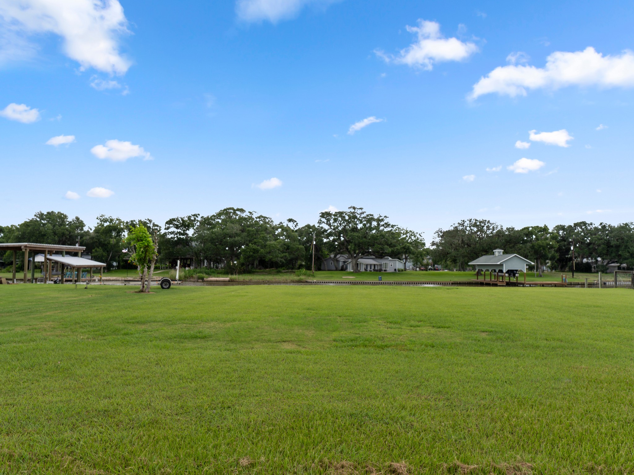 6 County Road 291 Sargent, TX 77414 - Photo 14 of 19 a view of grassy field with trees