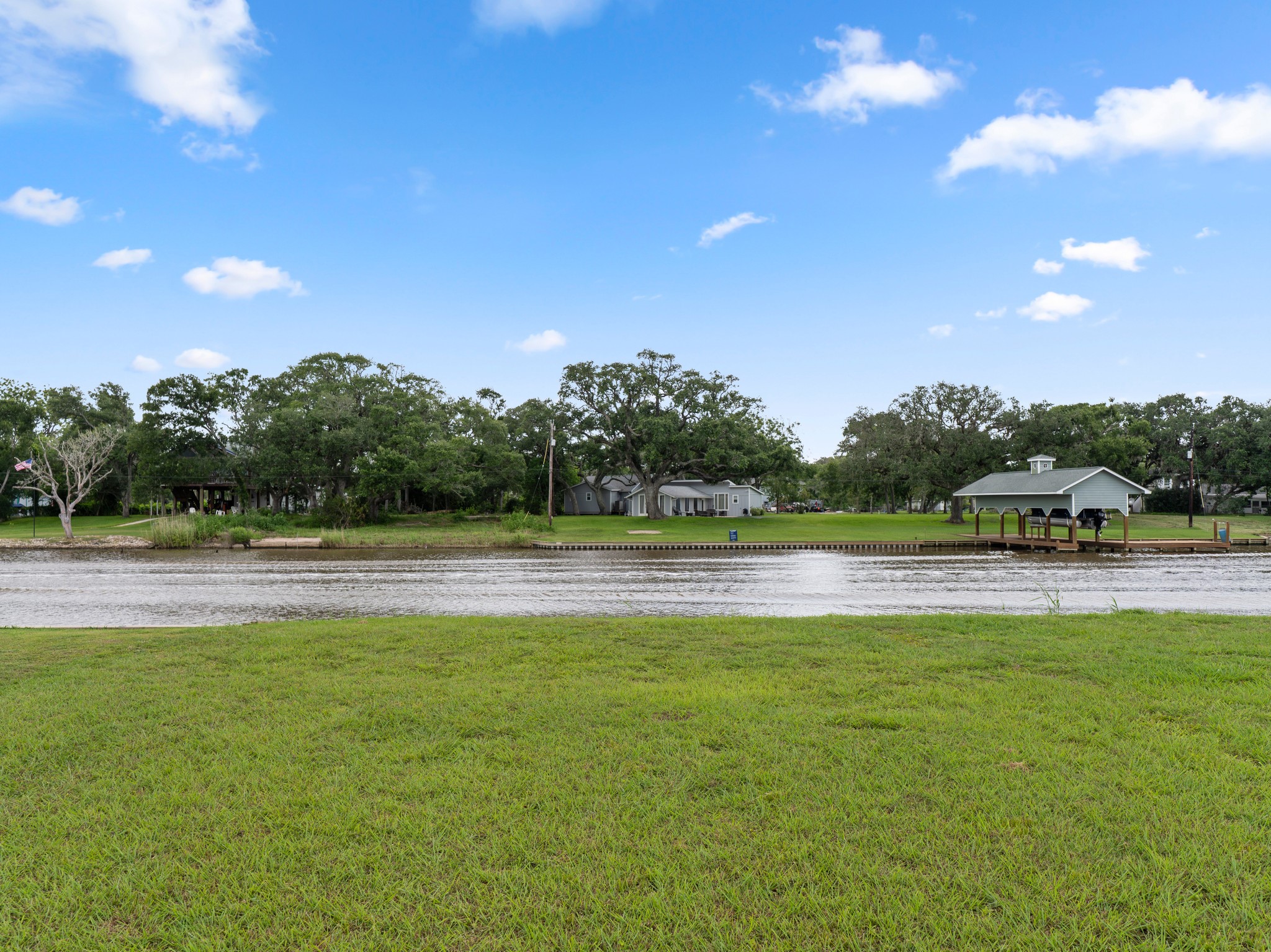 6 County Road 291 Sargent, TX 77414 - Photo 16 of 19 a view of swimming pool with outdoor seating and yard