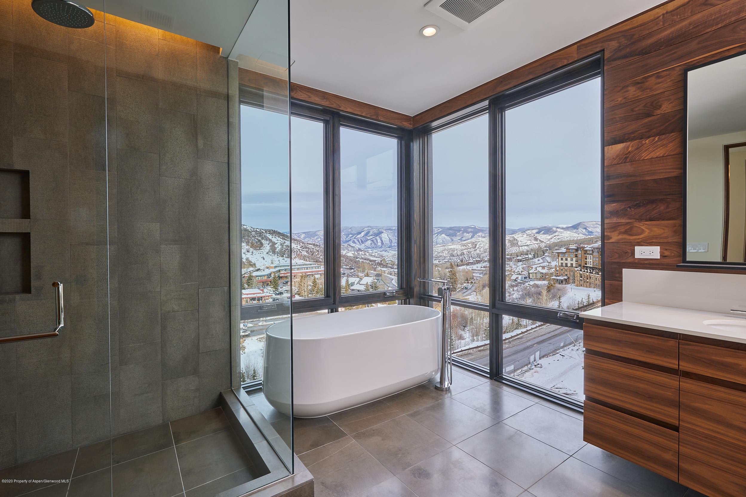 45 Wood Road, Unit 603 WEST Snowmass Village, CO 81615 - Photo 10 of 14 a spacious bathroom with a tub and shower