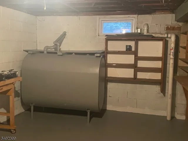 a room with gym equipment and shower