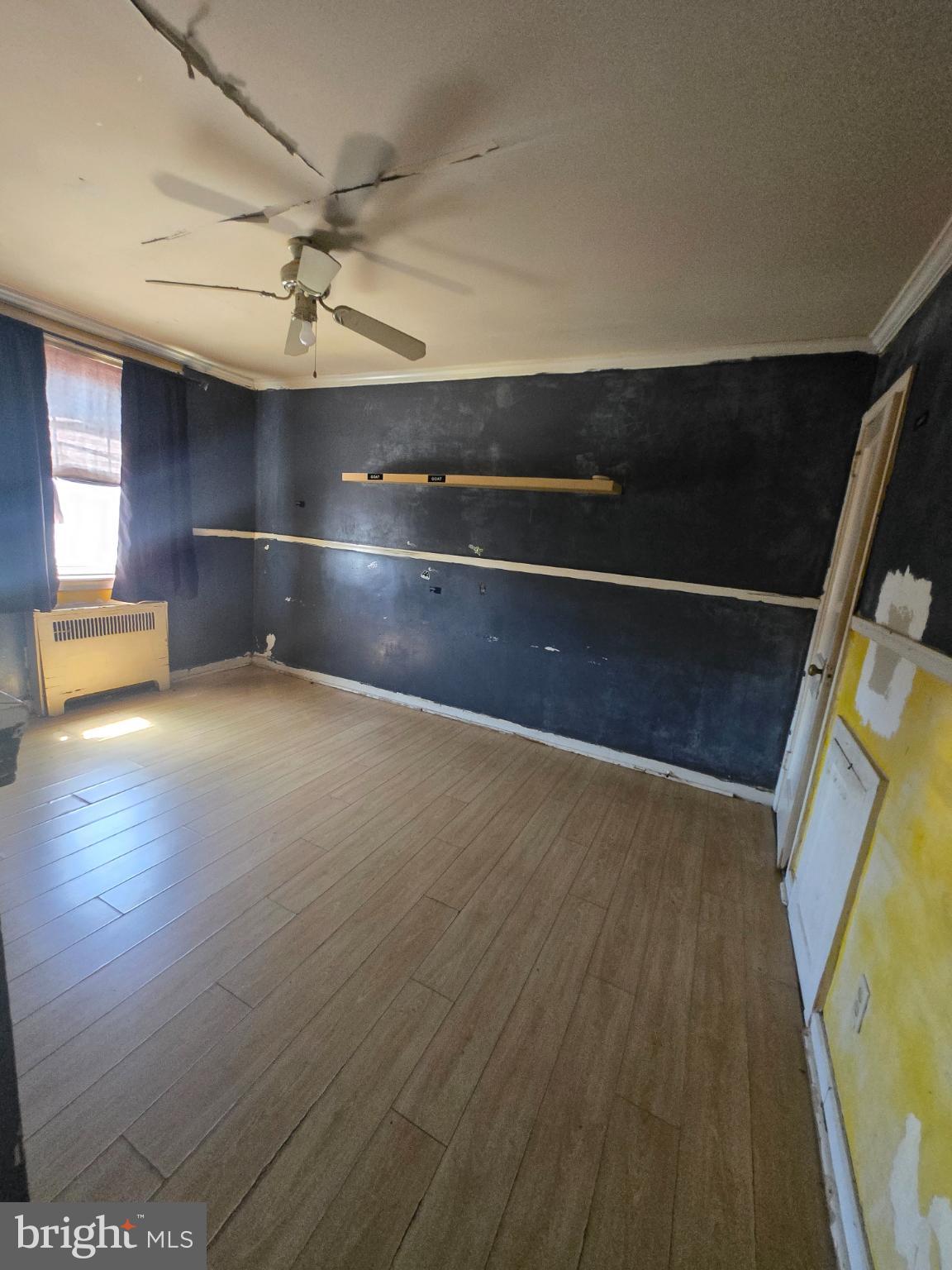 6347 Jackson Street Philadelphia, PA 19135 - Photo 8 of 11 Large second bedroom full of light.