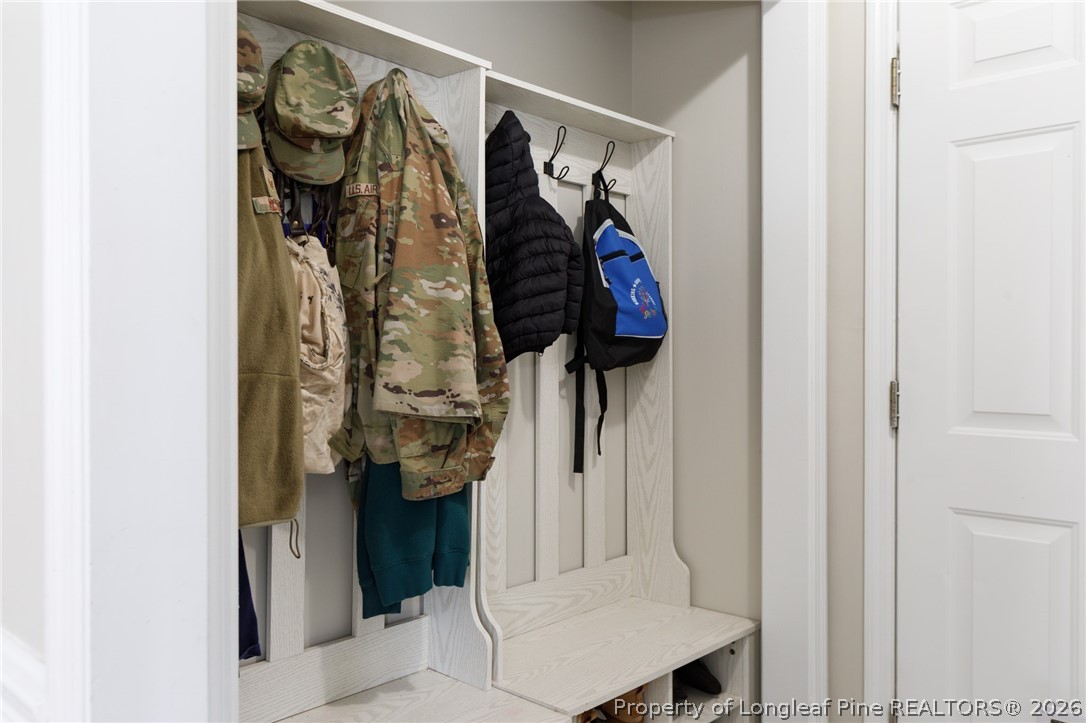 310 Timberidge Drive Raeford, NC 28376 - Photo 14 of 30 a view of walk in closet with clothes