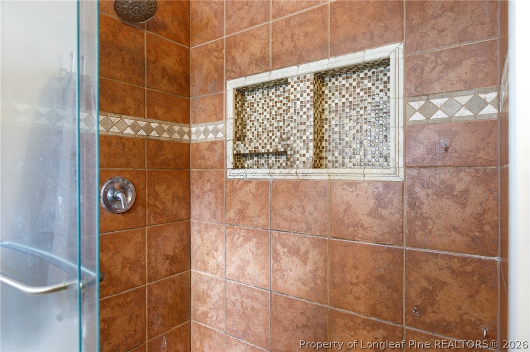 310 Timberidge Drive Raeford, NC 28376 - Photo 21 of 30 a bathroom with a shower