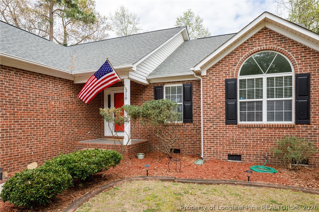 310 Timberidge Drive Raeford, NC 28376 - Photo 4 of 30 a view of house with outdoor space