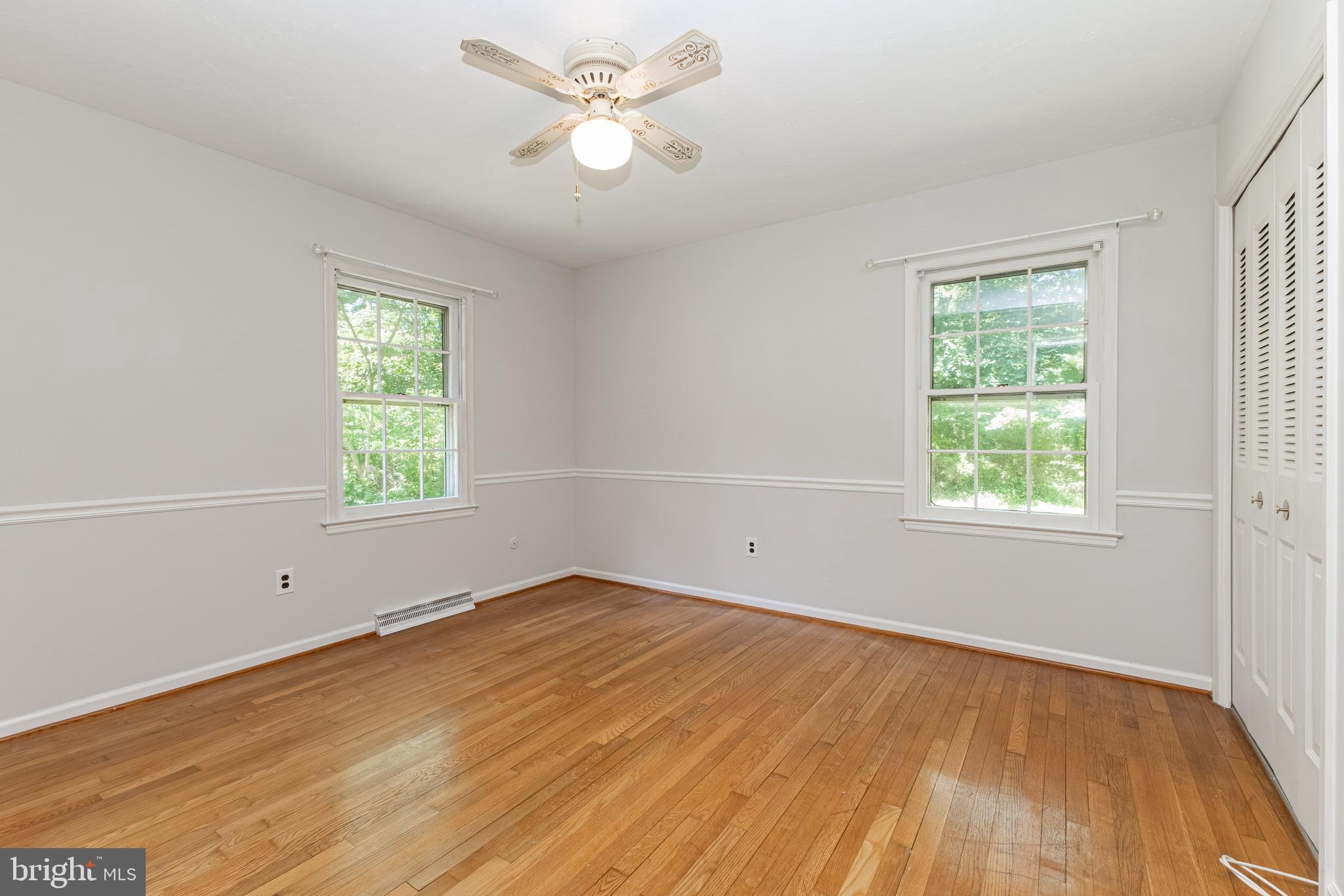 6550 Tip Hill Drive La Plata, MD 20646 - Photo 13 of 24 a view of empty room with wooden floor and fan