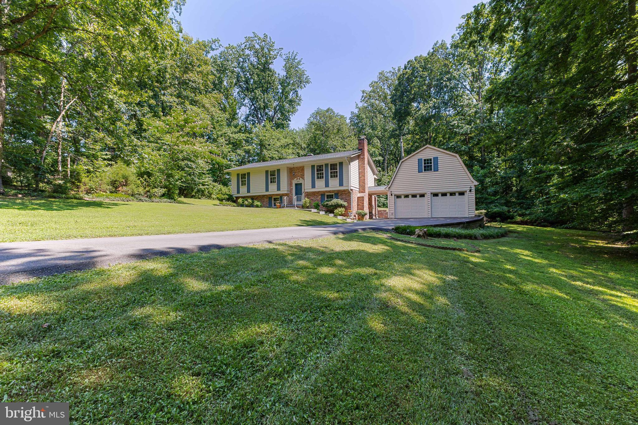 6550 Tip Hill Drive La Plata, MD 20646 - Photo 2 of 24 a front view of a house with garden