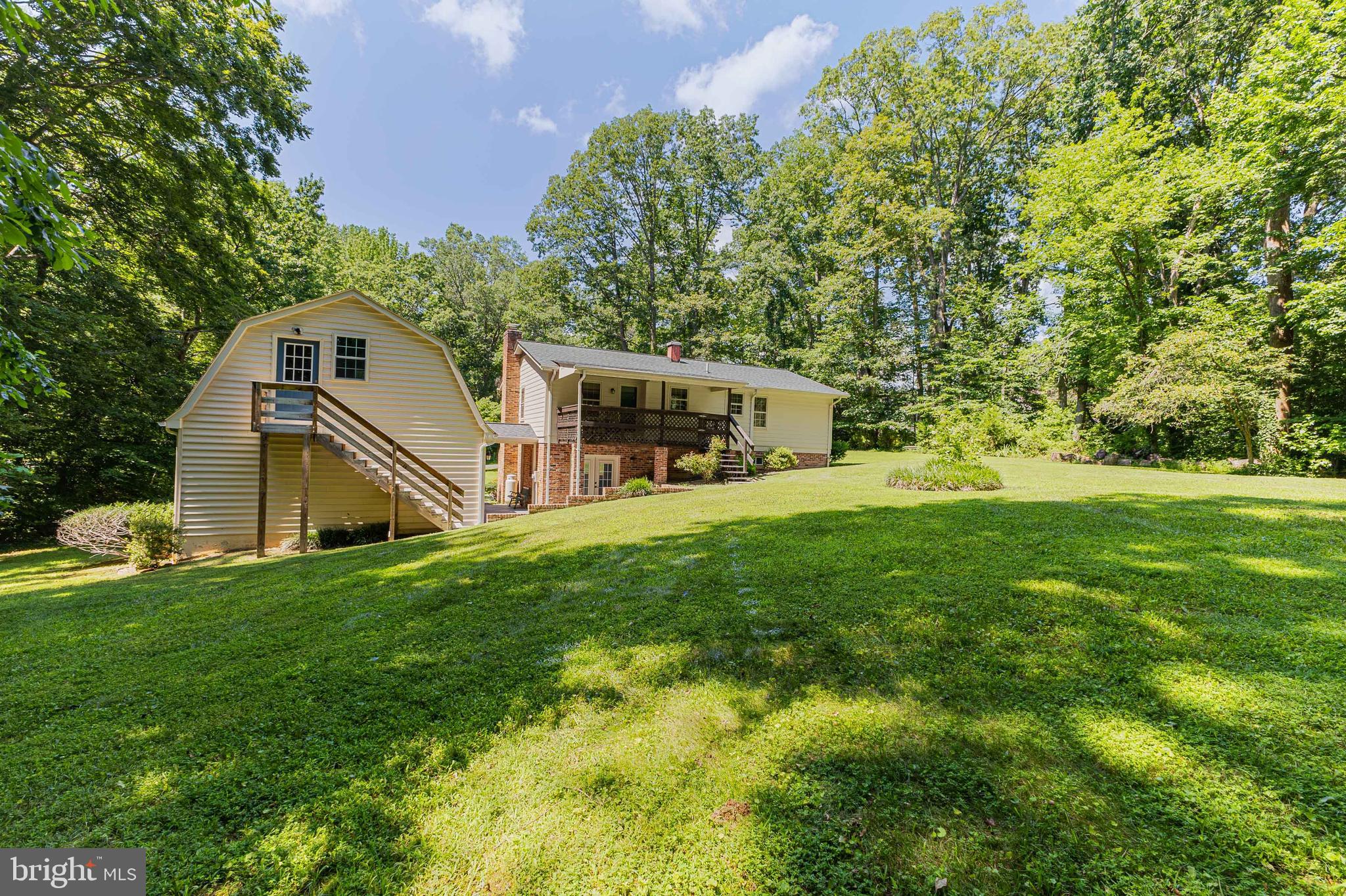 6550 Tip Hill Drive La Plata, MD 20646 - Photo 23 of 24 a front view of a house with yard and green space