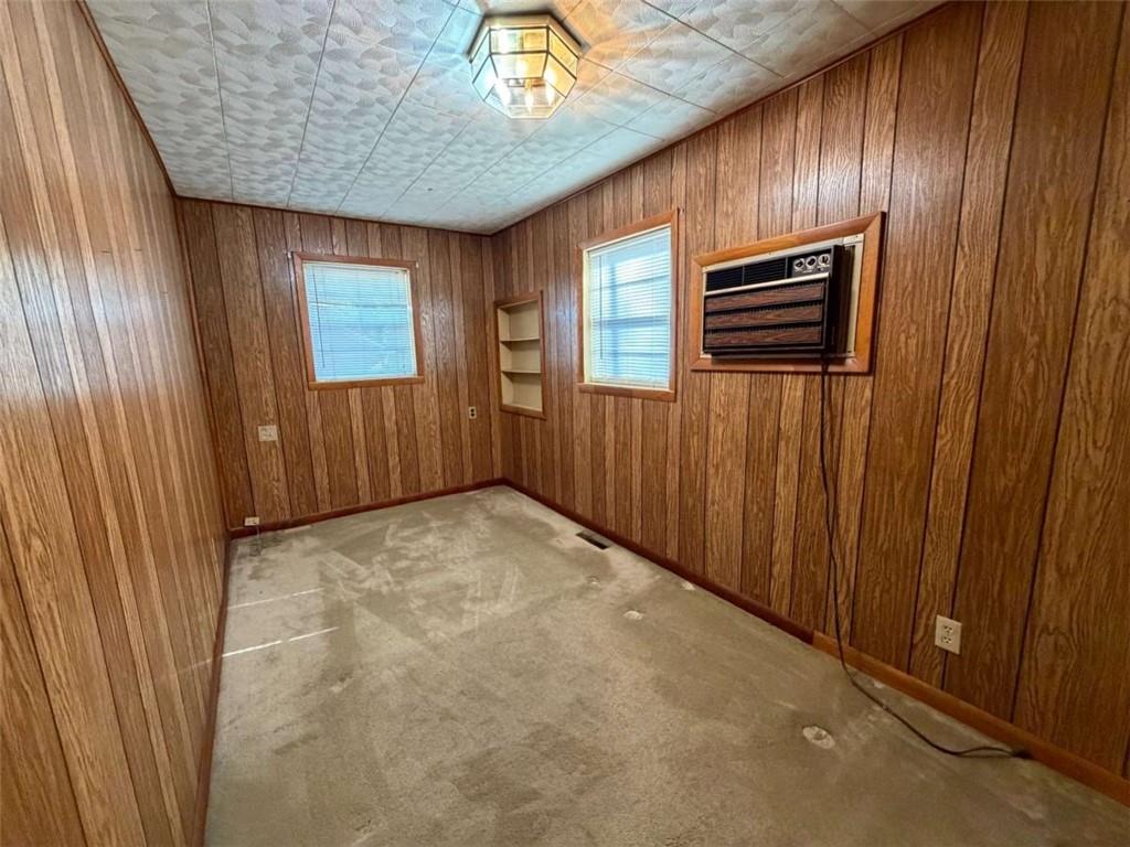 421 Cedar Avenue Southwest Rome, GA 30161 - Photo 11 of 26 an empty room with wooden floor and windows