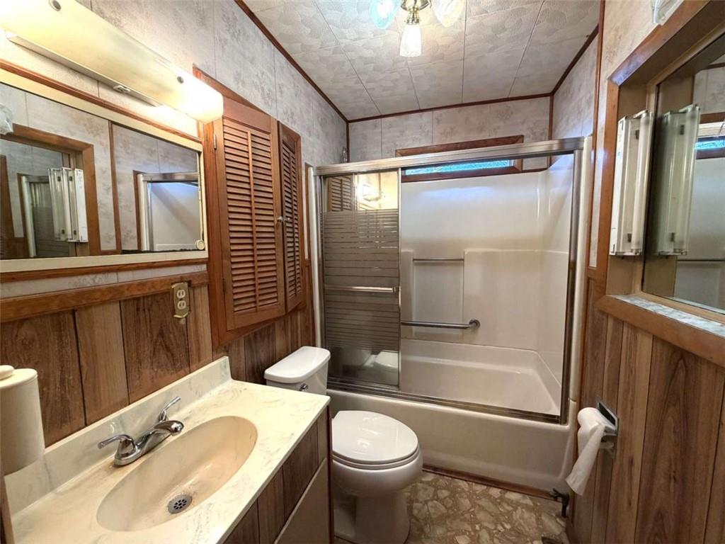 421 Cedar Avenue Southwest Rome, GA 30161 - Photo 12 of 26 a bathroom with a sink toilet and shower