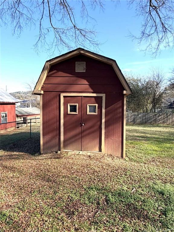 421 Cedar Avenue Southwest Rome, GA 30161 - Photo 21 of 26 a front view of a house with garden