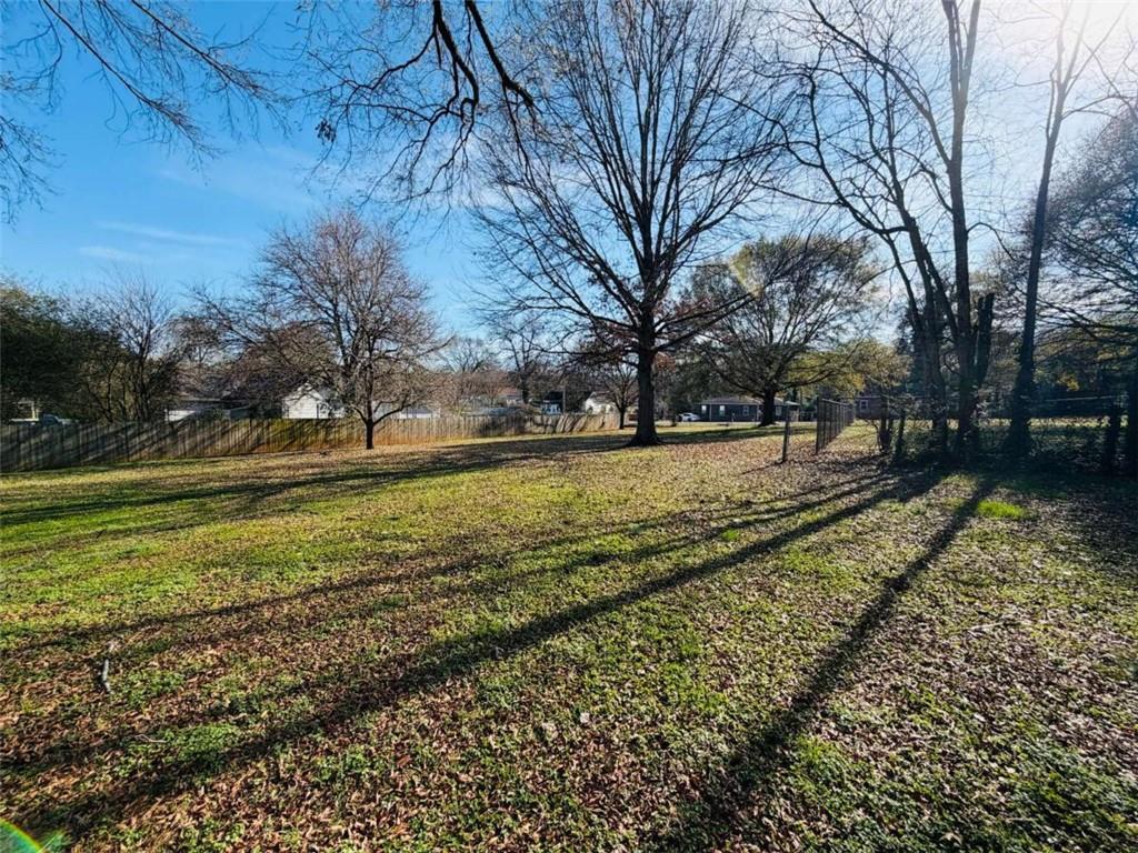 421 Cedar Avenue Southwest Rome, GA 30161 - Photo 26 of 26 a view of a yard with large trees