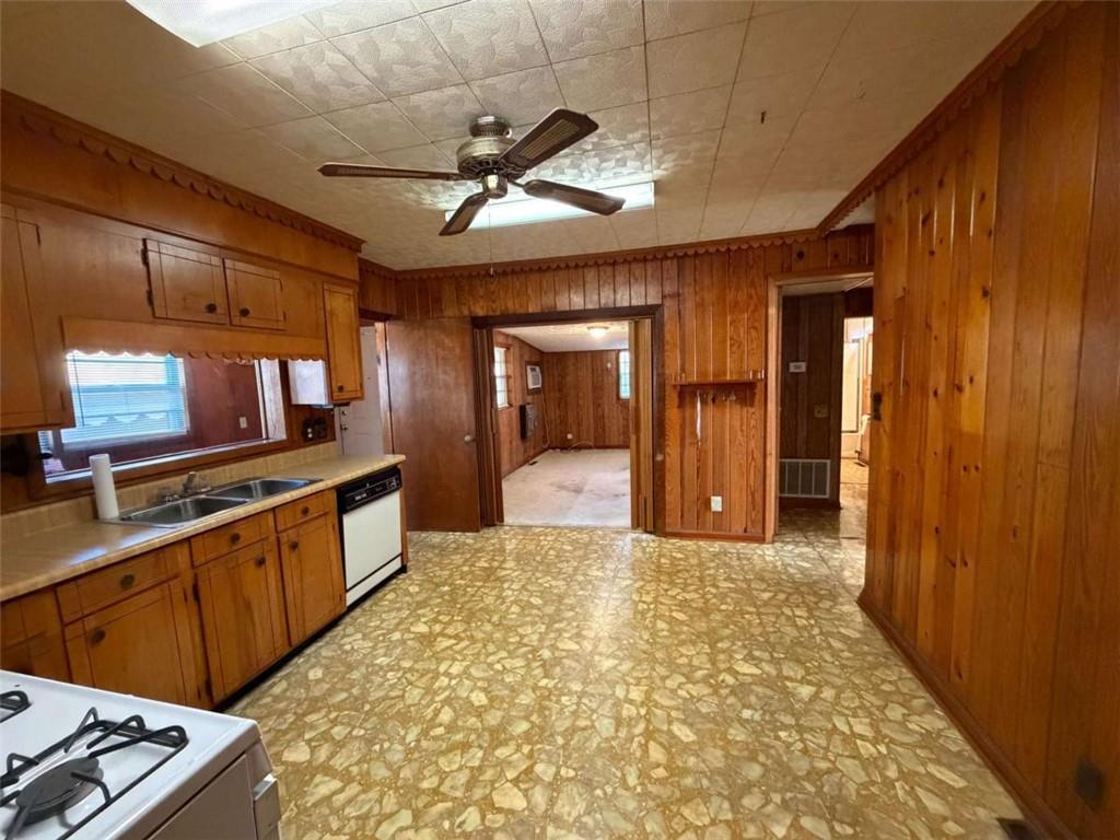 421 Cedar Avenue Southwest Rome, GA 30161 - Photo 5 of 26 a large kitchen with cabinets
