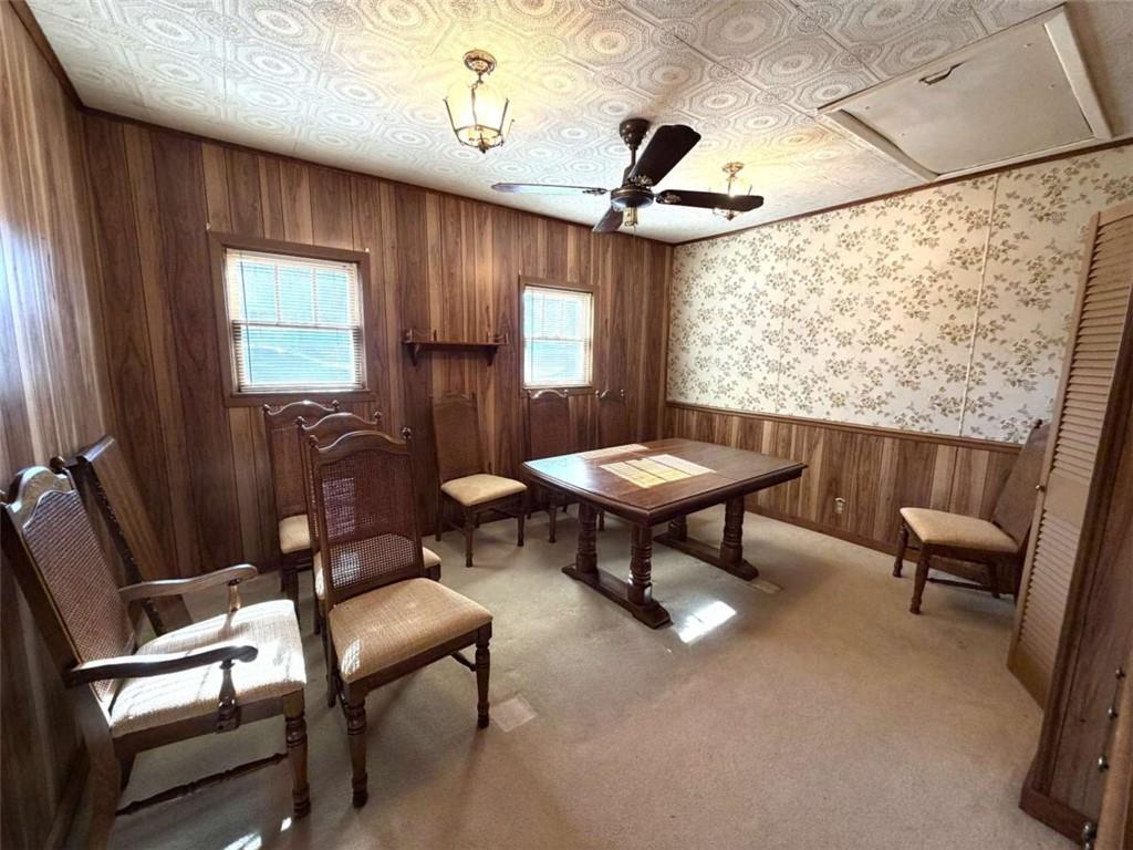 421 Cedar Avenue Southwest Rome, GA 30161 - Photo 9 of 26 a living room with furniture a window and a chandelier