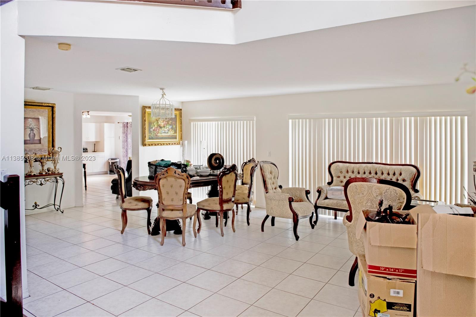 11331 Rockinghorse Road Cooper City, FL 33026 - Photo 4 of 10 a view of a dining area with furniture