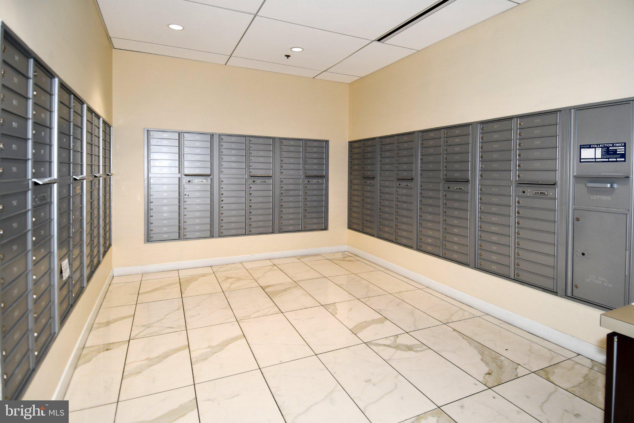 5101 River Road, Unit 712 Bethesda, MD 20816 - Photo 35 of 38 Modern mailroom with secure lockers.