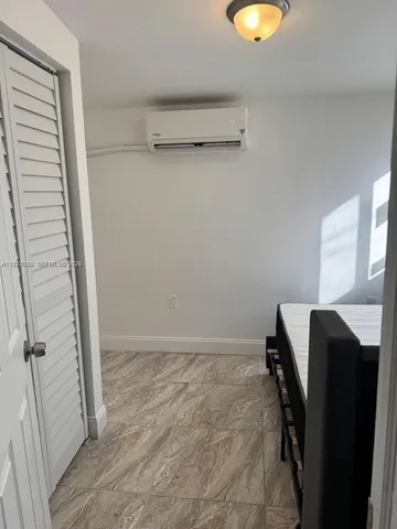 a view of a room with racks on the wall