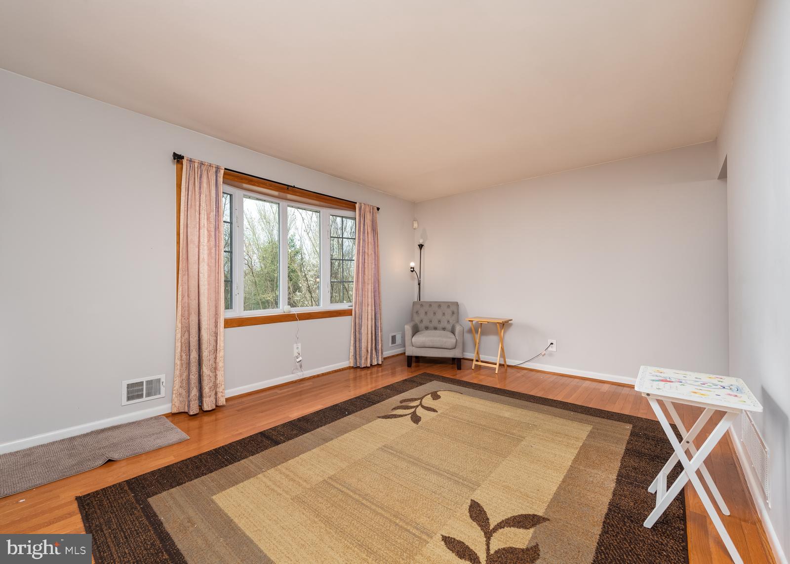 6830 Richardson Road Baltimore, MD 21207 - Photo 11 of 22 Living room with large front window