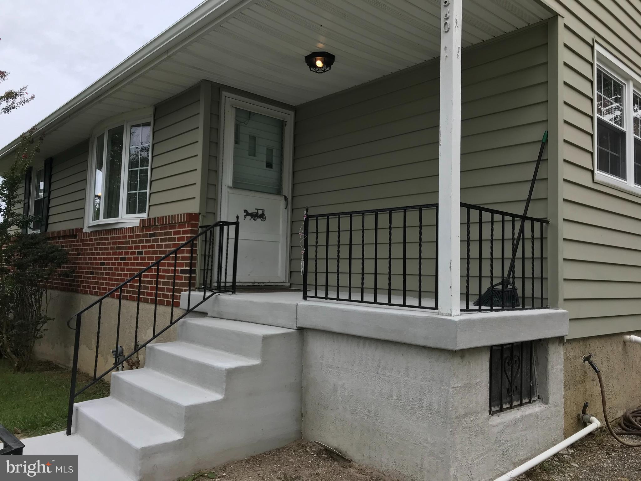 6830 Richardson Road Baltimore, MD 21207 - Photo 22 of 22 Cozy front porch with new cement stairs