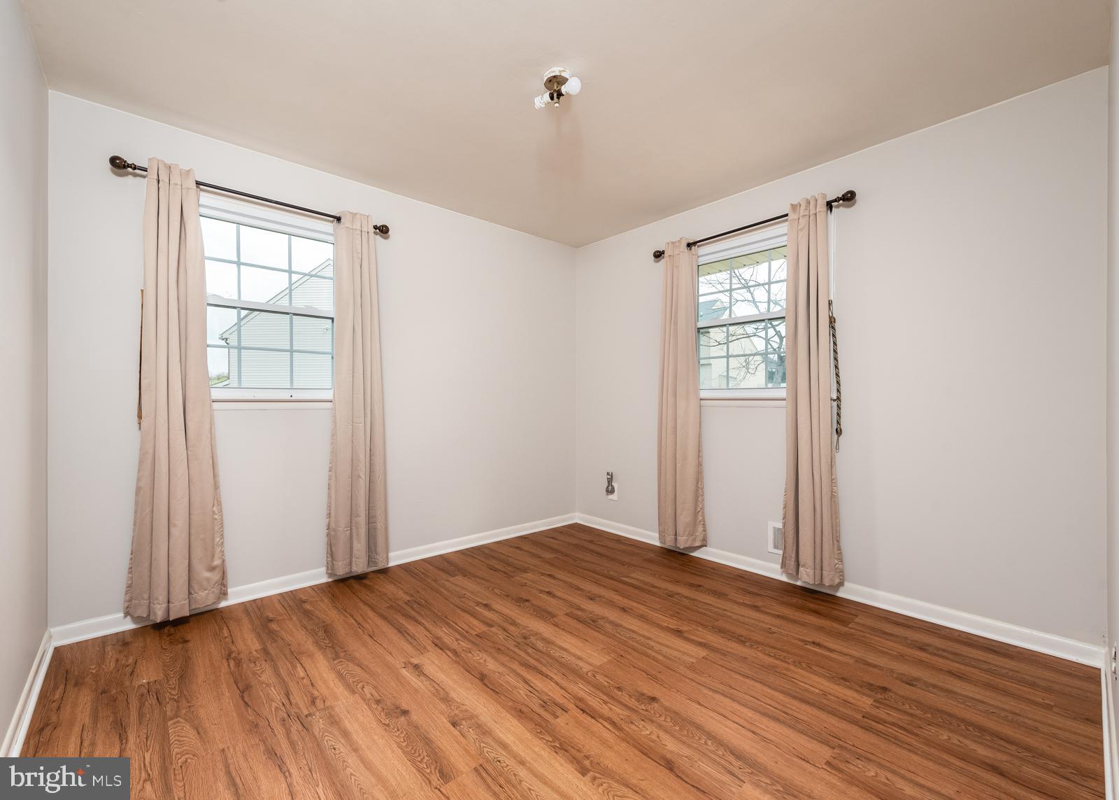 6830 Richardson Road Baltimore, MD 21207 - Photo 4 of 22 Bedroom 1 with hardwood floors main level