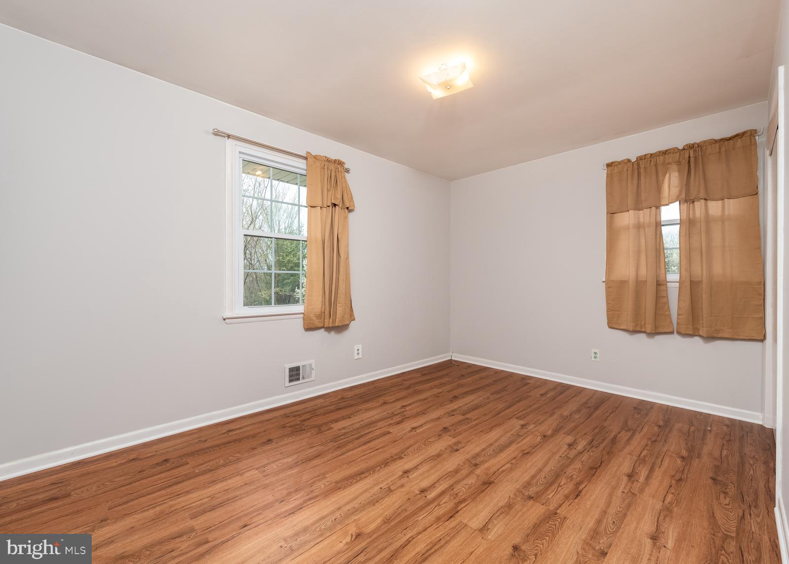 6830 Richardson Road Baltimore, MD 21207 - Photo 7 of 22 Bedroom 2 with hardwood floors main level