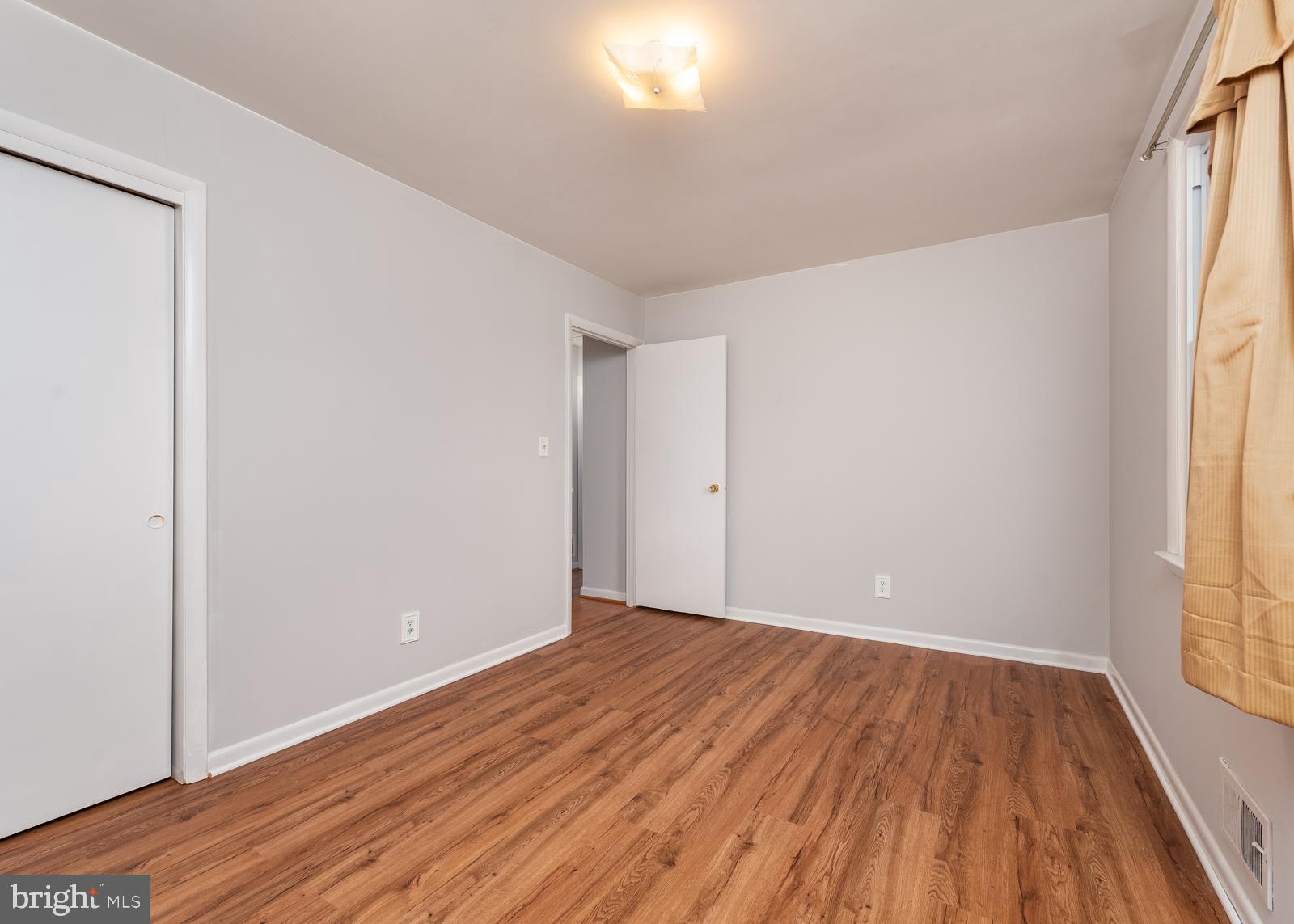 6830 Richardson Road Baltimore, MD 21207 - Photo 8 of 22 Bedroom 2 with hardwood floors main level