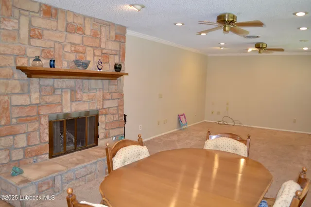 a bedroom with a bed and a fireplace