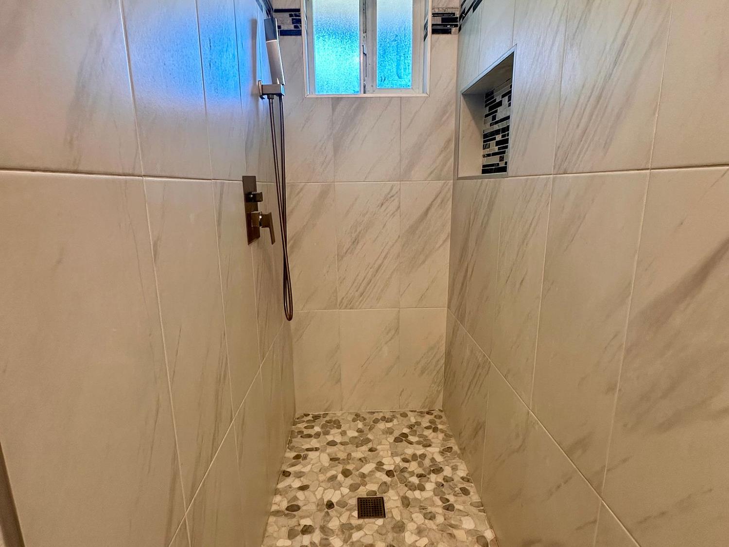 5743 Haskell Avenue Carmichael, CA 95608 - Photo 21 of 47 a bathroom with a shower