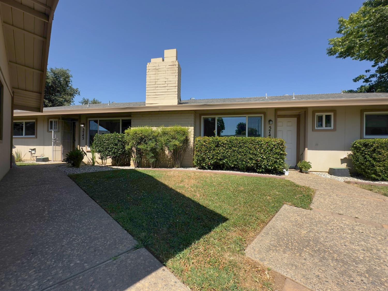 5743 Haskell Avenue Carmichael, CA 95608 - Photo 27 of 47 a front view of a house with garden