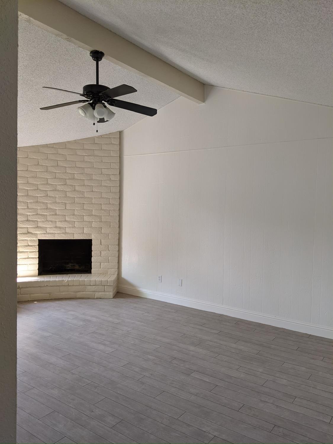 5743 Haskell Avenue Carmichael, CA 95608 - Photo 29 of 47 a view of an empty room with a fireplace