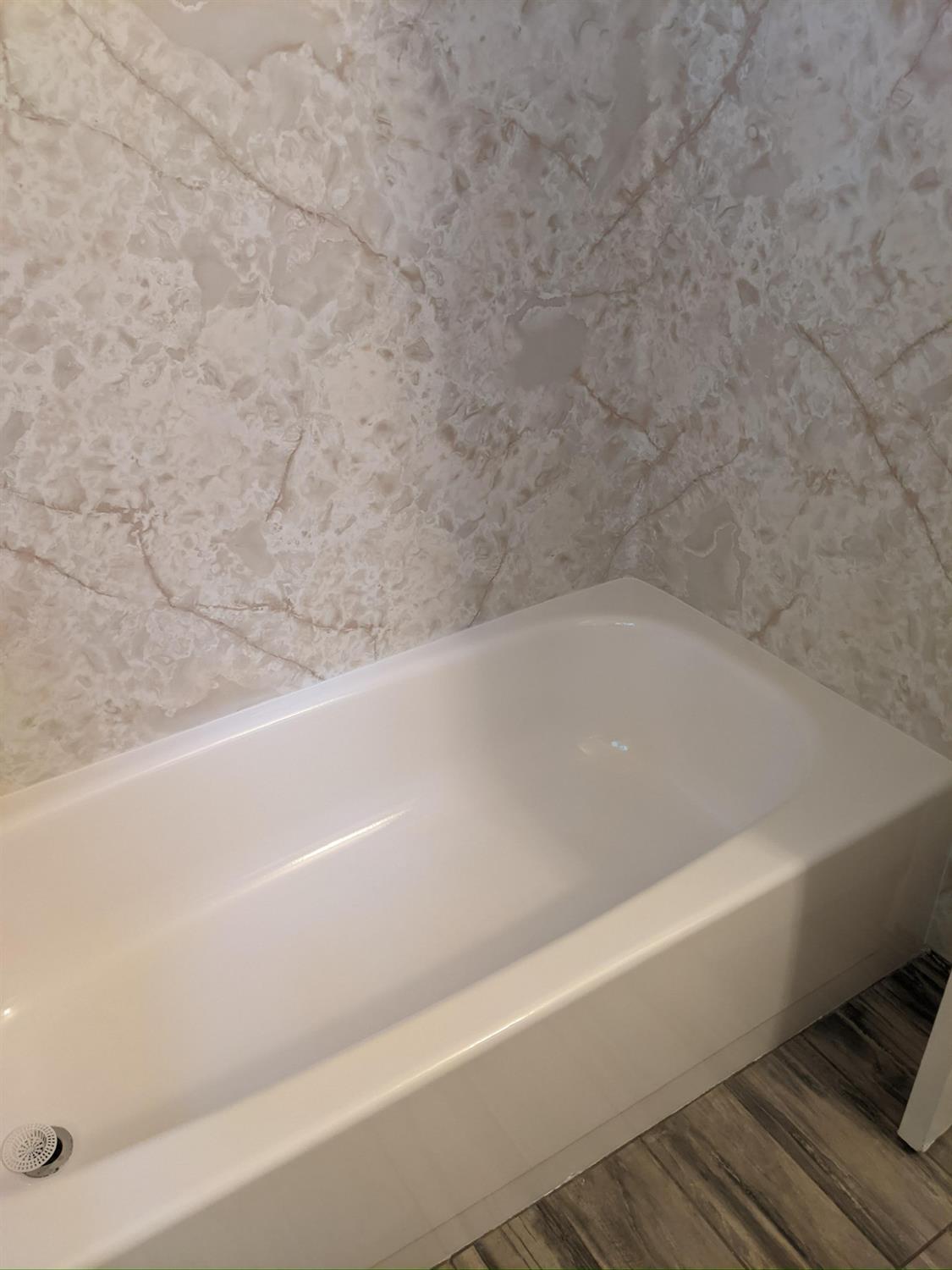 5743 Haskell Avenue Carmichael, CA 95608 - Photo 37 of 47 a bathroom with bathtub and shower