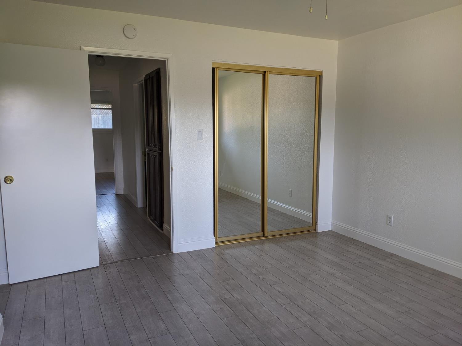 5743 Haskell Avenue Carmichael, CA 95608 - Photo 41 of 47 an empty room with wooden floor and closet