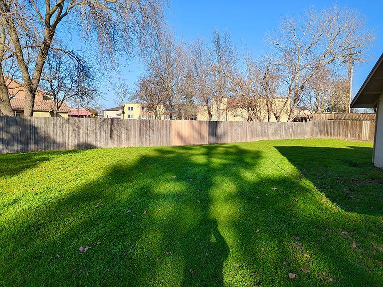 5743 Haskell Avenue Carmichael, CA 95608 - Photo 47 of 47 a view of yard with swimming pool and green space