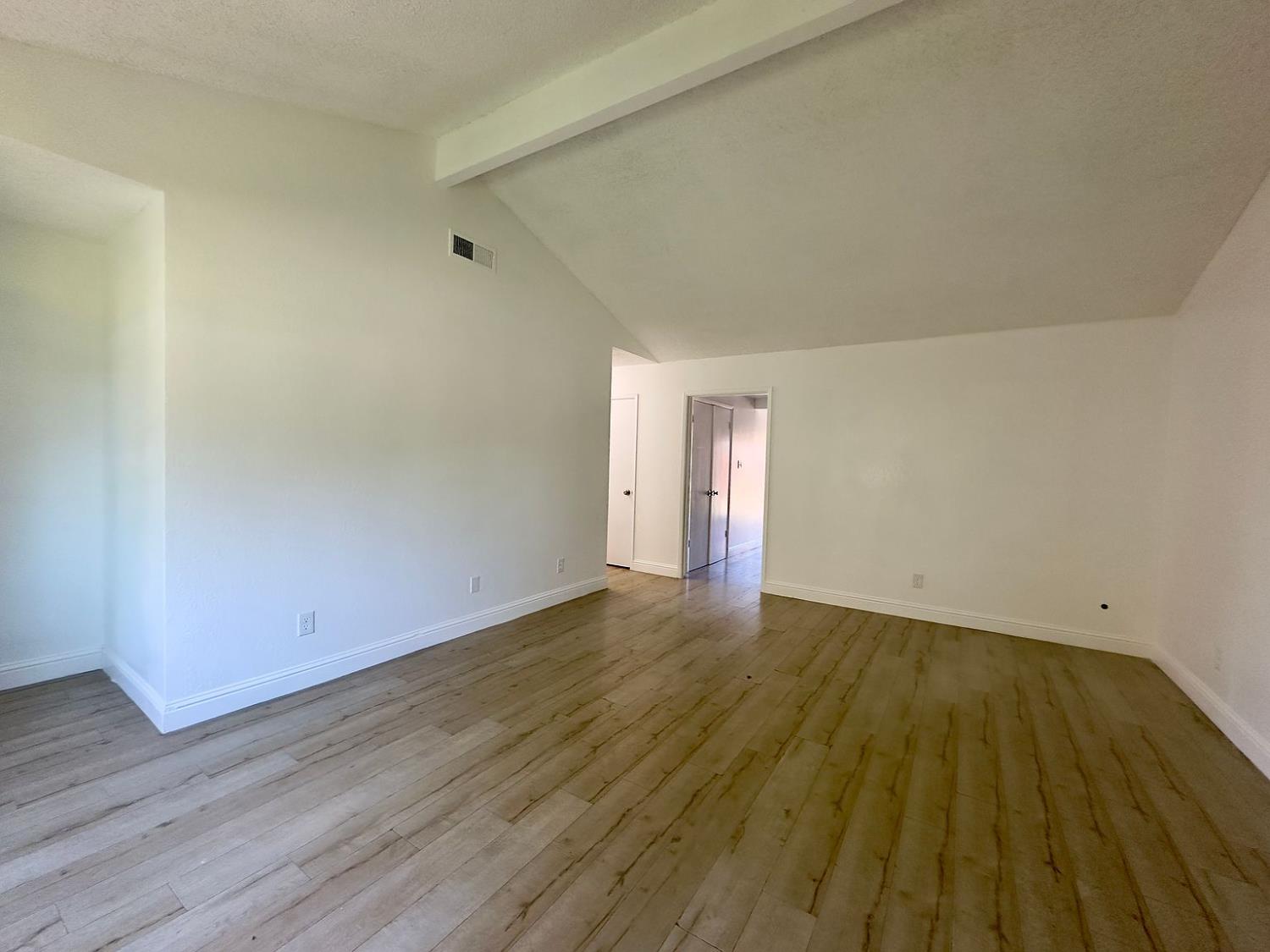 5743 Haskell Avenue Carmichael, CA 95608 - Photo 5 of 47 a view of an empty room and wooden floor