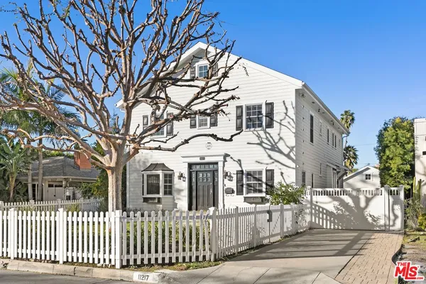 a front view of a house with a porch