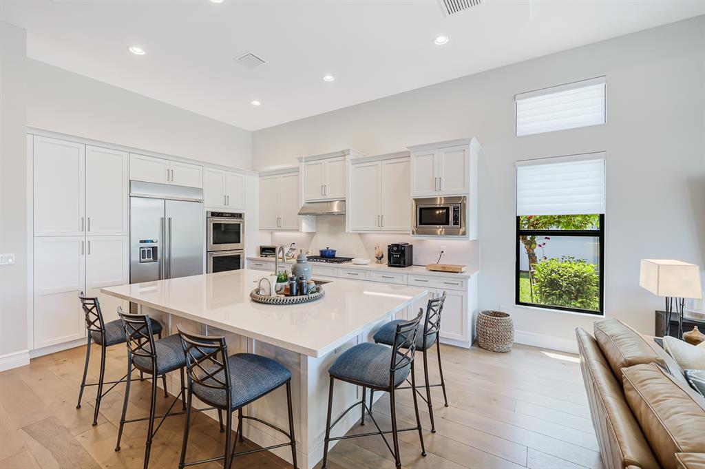 17401 Santaluce Manor Boca Raton, FL 33496 - Photo 18 of 84 a view of a dining room with furniture and a table