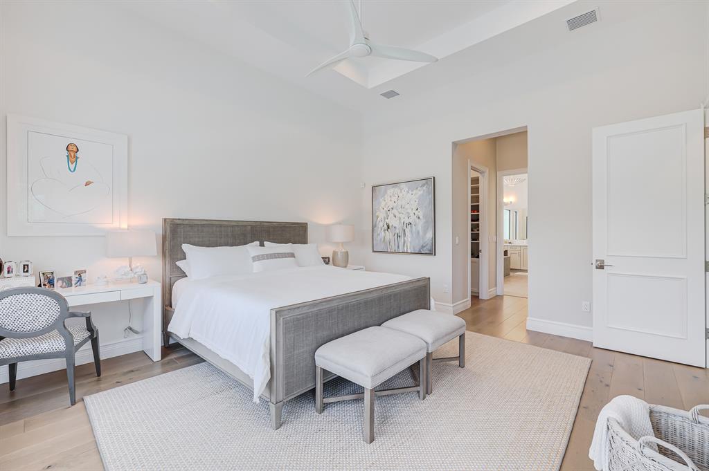 17401 Santaluce Manor Boca Raton, FL 33496 - Photo 26 of 84 a bedroom with a bed and a chair