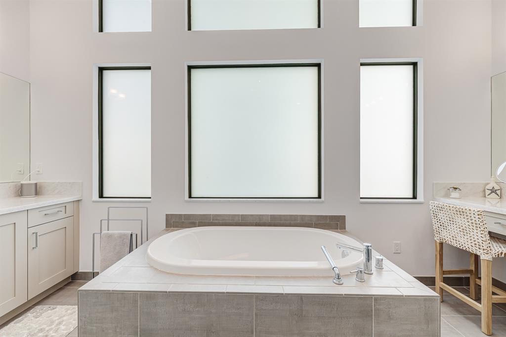 17401 Santaluce Manor Boca Raton, FL 33496 - Photo 30 of 84 a white bath tub sitting next to a white sink