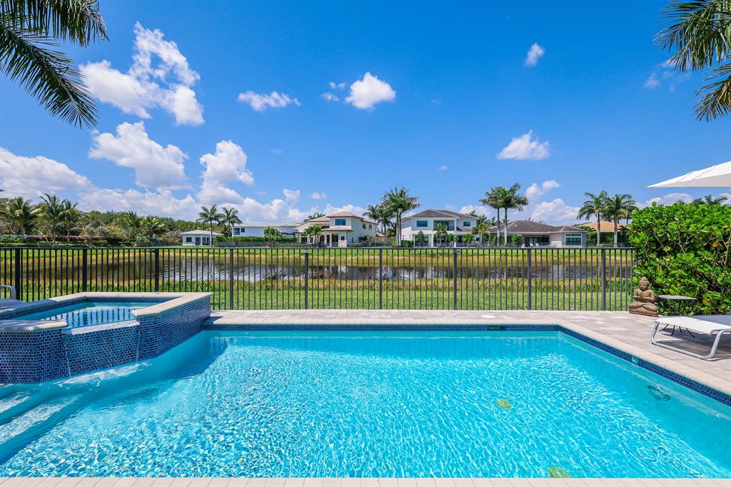 17401 Santaluce Manor Boca Raton, FL 33496 - Photo 52 of 84 a view of a golf course with a lake view