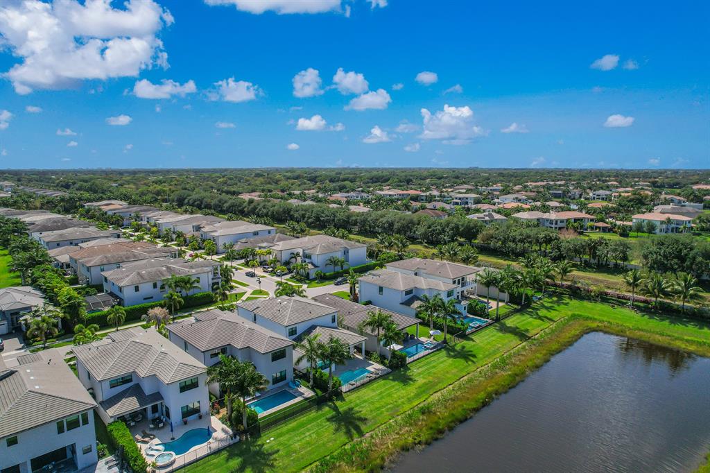 17401 Santaluce Manor Boca Raton, FL 33496 - Photo 68 of 84 an aerial view of a house with a lake view