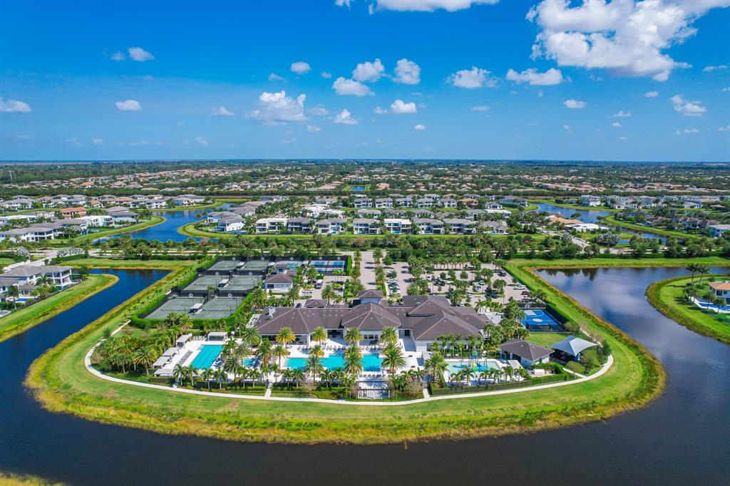 17401 Santaluce Manor Boca Raton, FL 33496 - Photo 71 of 84 a view of a swimming pool with a garden