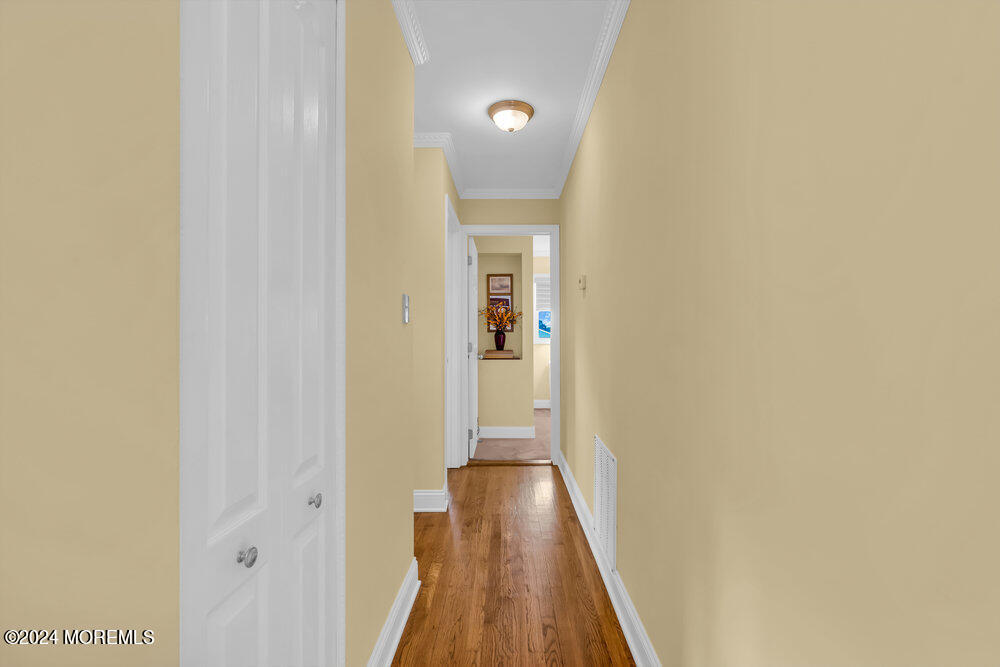 54 Salem Hill Road Howell, NJ 07731 - Photo 36 of 71 a view of a hallway with wooden floor