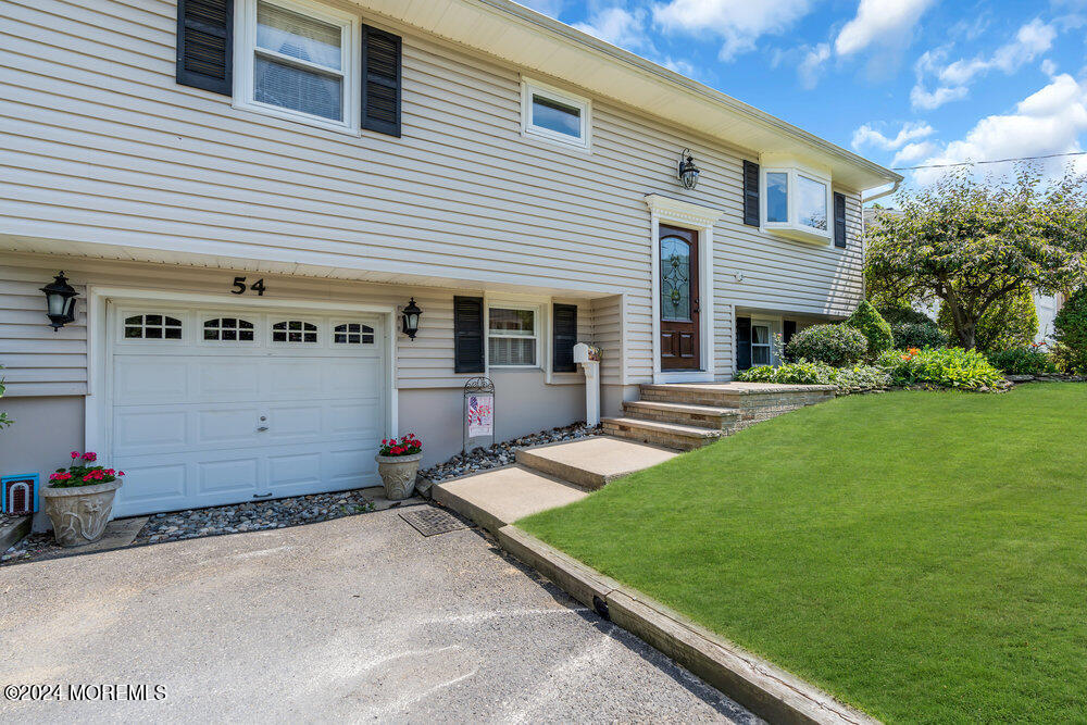 54 Salem Hill Road Howell, NJ 07731 - Photo 5 of 71 a view of a house with a yard and sitting area