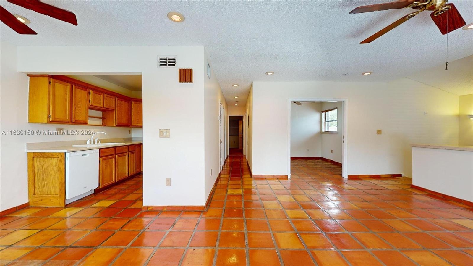 10665 Southwest 113th Place, Unit 95D Miami, FL 33176 - Photo 13 of 42 a view interior of the house with wooden floor