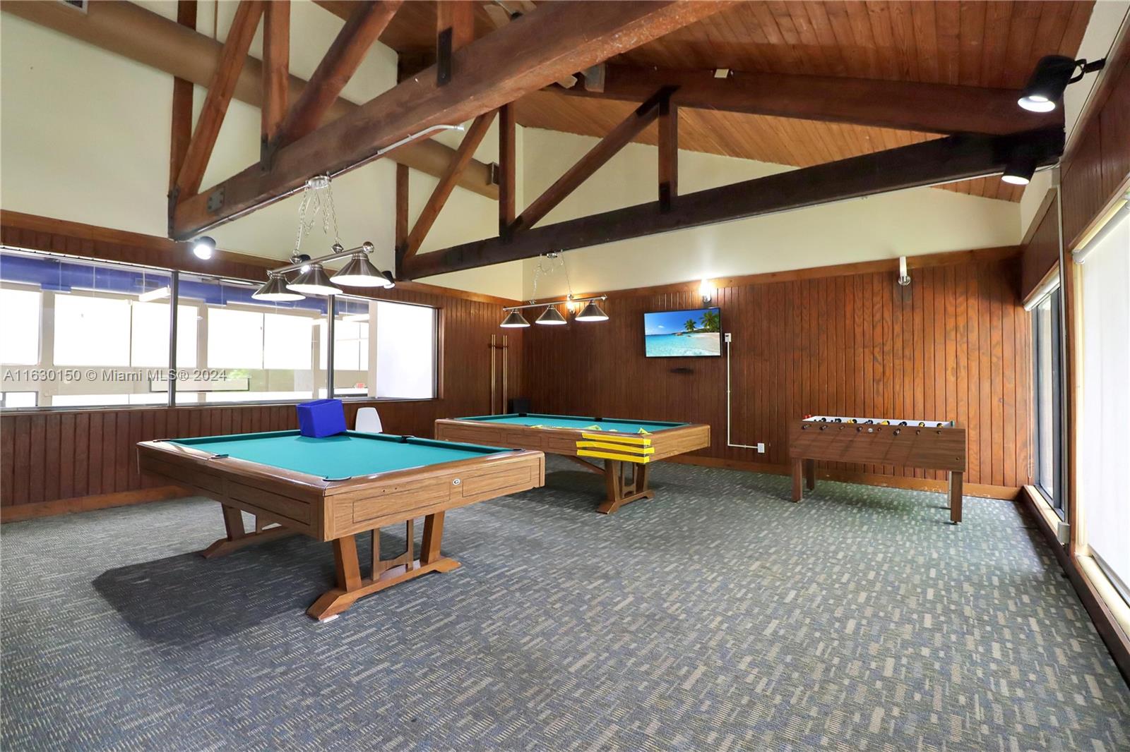 10665 Southwest 113th Place, Unit 95D Miami, FL 33176 - Photo 35 of 42 a room with lots of furniture and windows